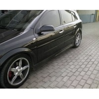 Бічні спідниці HB (під фарбування) для Opel Astra H 2004-2013рр.